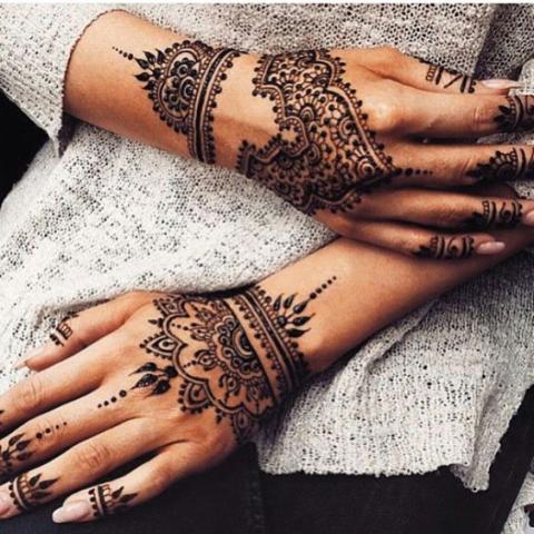 henna designs on two hands